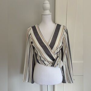 Women’s crop wrap blouse by Gianni Bini